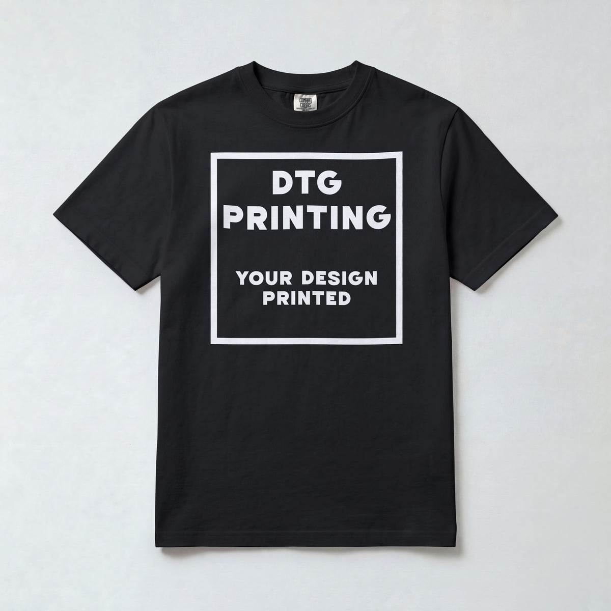 Custom Comfort Colors 1717 t-shirt in Black with a sample white-ink DTG print