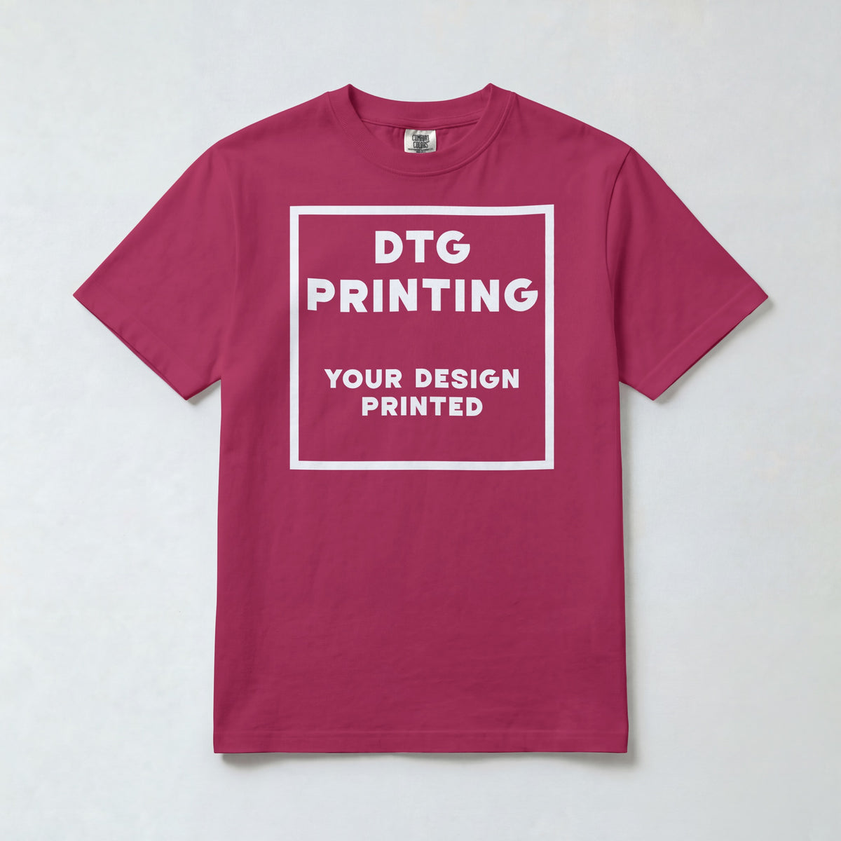 Custom Comfort Colors 1717 t-shirt in Crimson with a sample white-ink DTG print