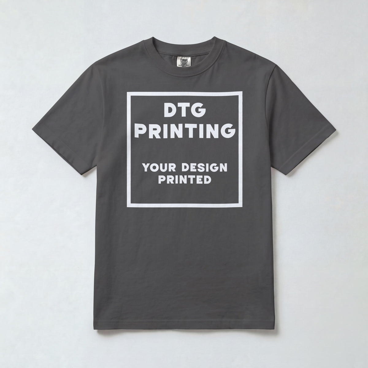 Custom Comfort Colors 1717 t-shirt in Pepper with a sample white-ink DTG print
