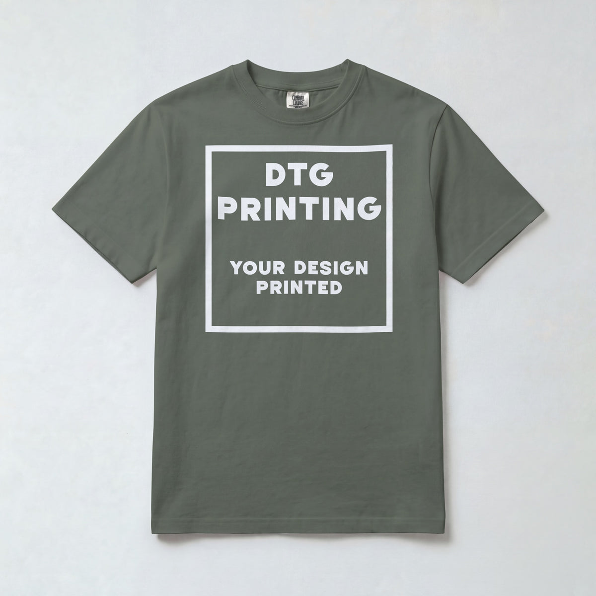 Custom Comfort Colors 1717 t-shirt in Sage with a sample white-ink DTG print