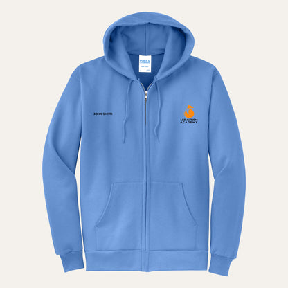 Carolina Blue adult full-zip hoodie with the orange Lee Autism Academy fox logo on the left chest and a custom name on the right chest