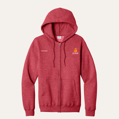 Heather Red adult full-zip hoodie with the orange Lee Autism Academy fox logo on the left chest and a custom name on the right chest
