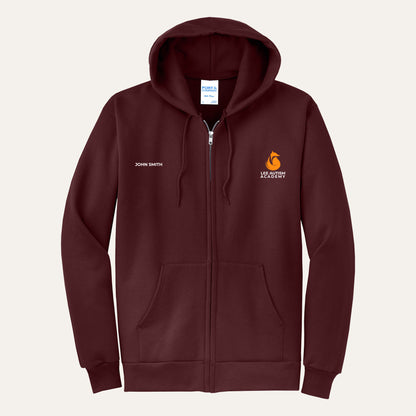 Maroon adult full-zip hoodie with the orange Lee Autism Academy fox logo on the left chest and a custom name on the right chest