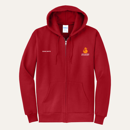Red adult full-zip hoodie with the orange Lee Autism Academy fox logo on the left chest and a custom name on the right chest