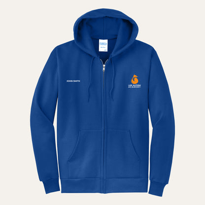 True Royal adult full-zip hoodie with the orange Lee Autism Academy fox logo on the left chest and a custom name on the right chest